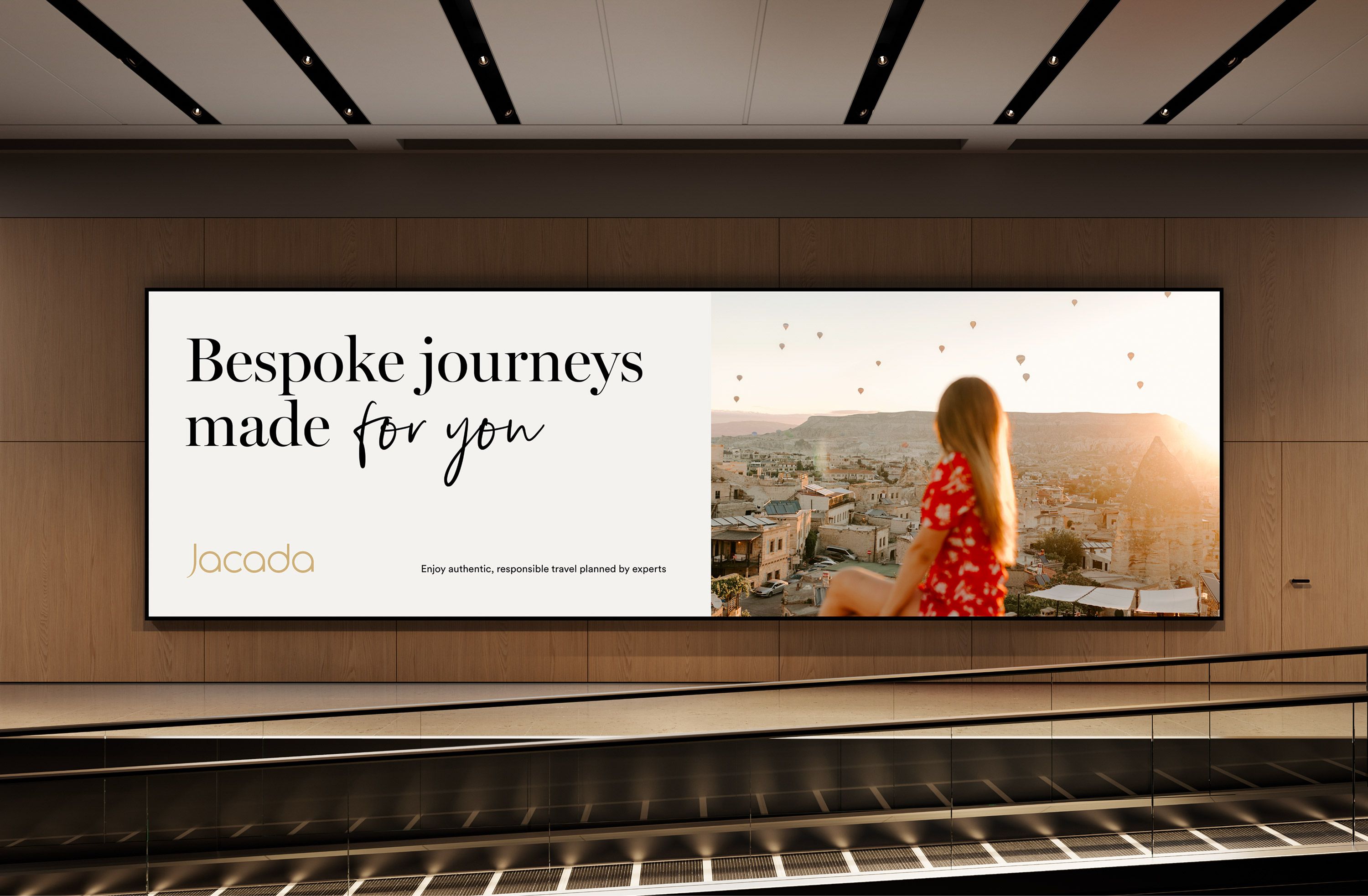 Out-of-home ad from the Jacada Travel brand refinement featuring the headline Bespoke journeys made for you