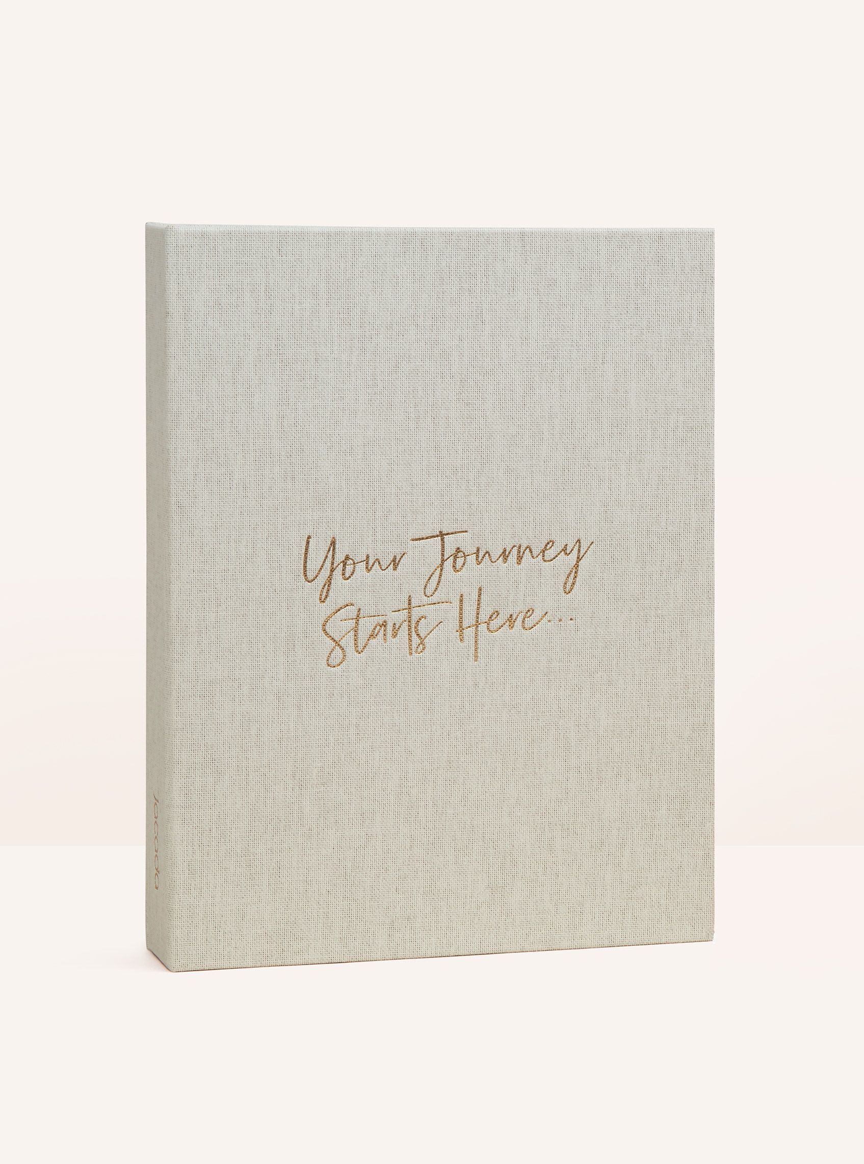 Branded folder with gold foil embossing that reads Your journey starts here