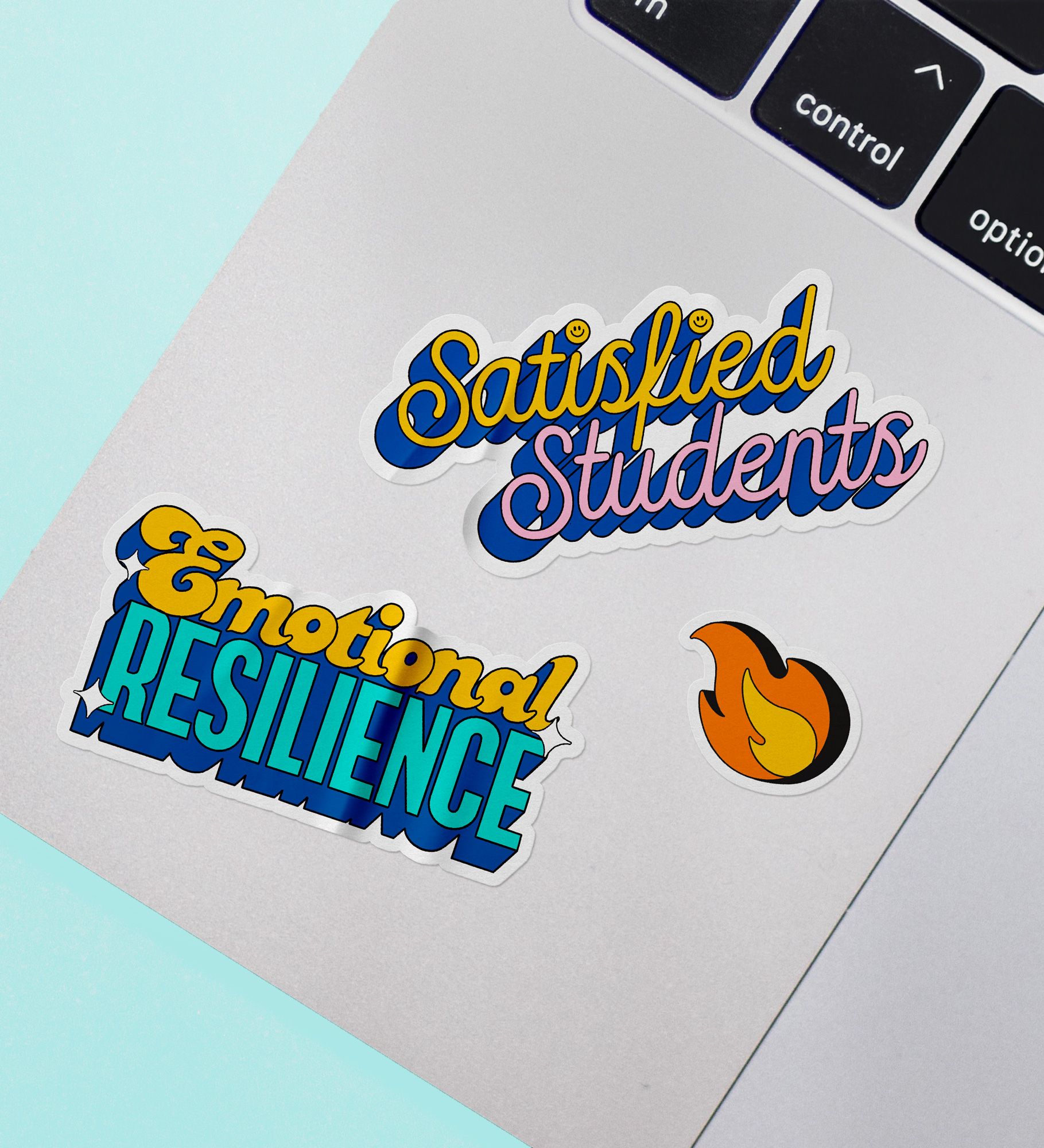 Creative campaign stickers applied to a university student laptop