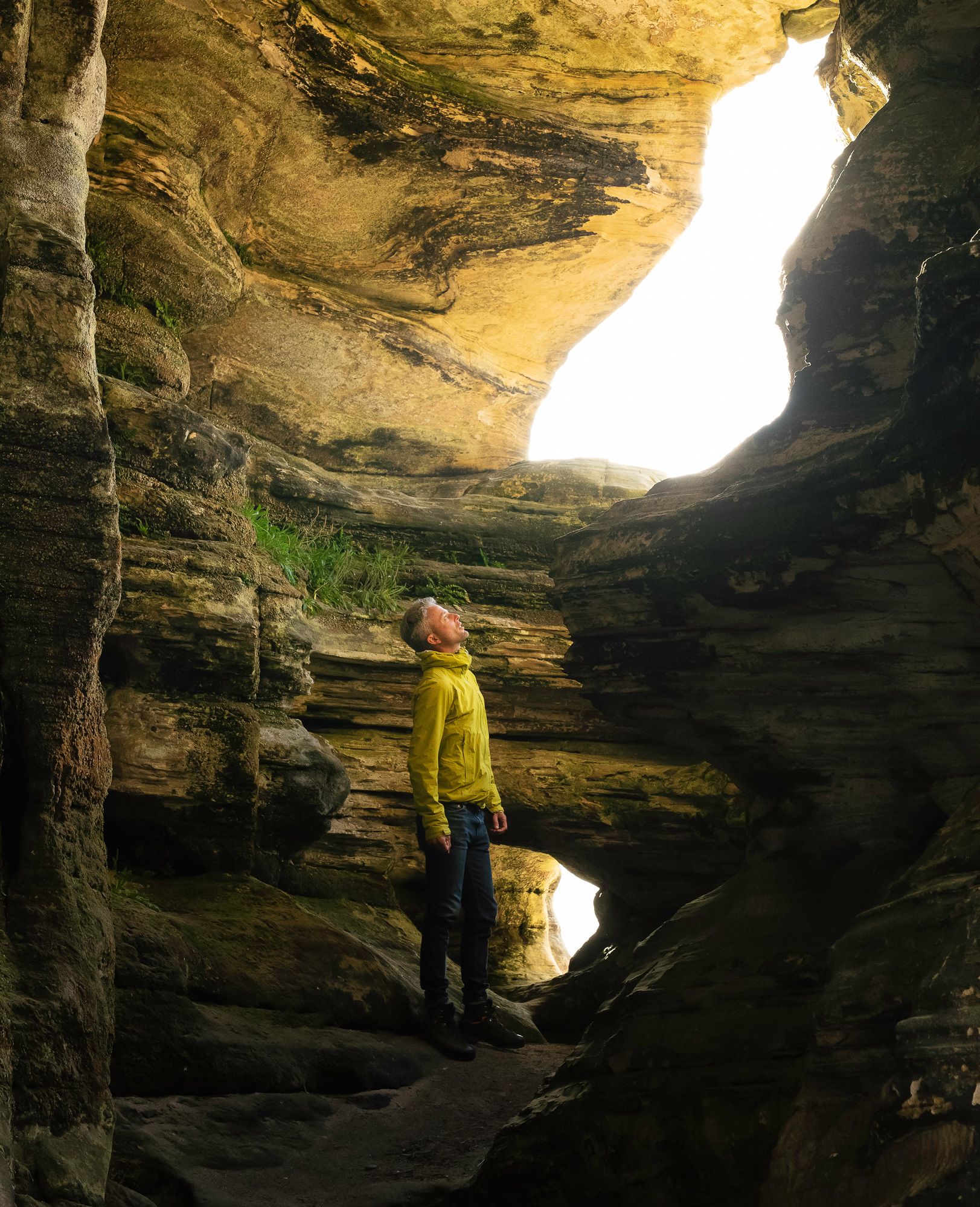 Man exploring a cave
